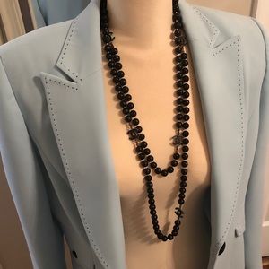 Blue blazer with black detailing.